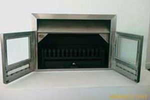 Fireplace with stainless steel facade and glass doors